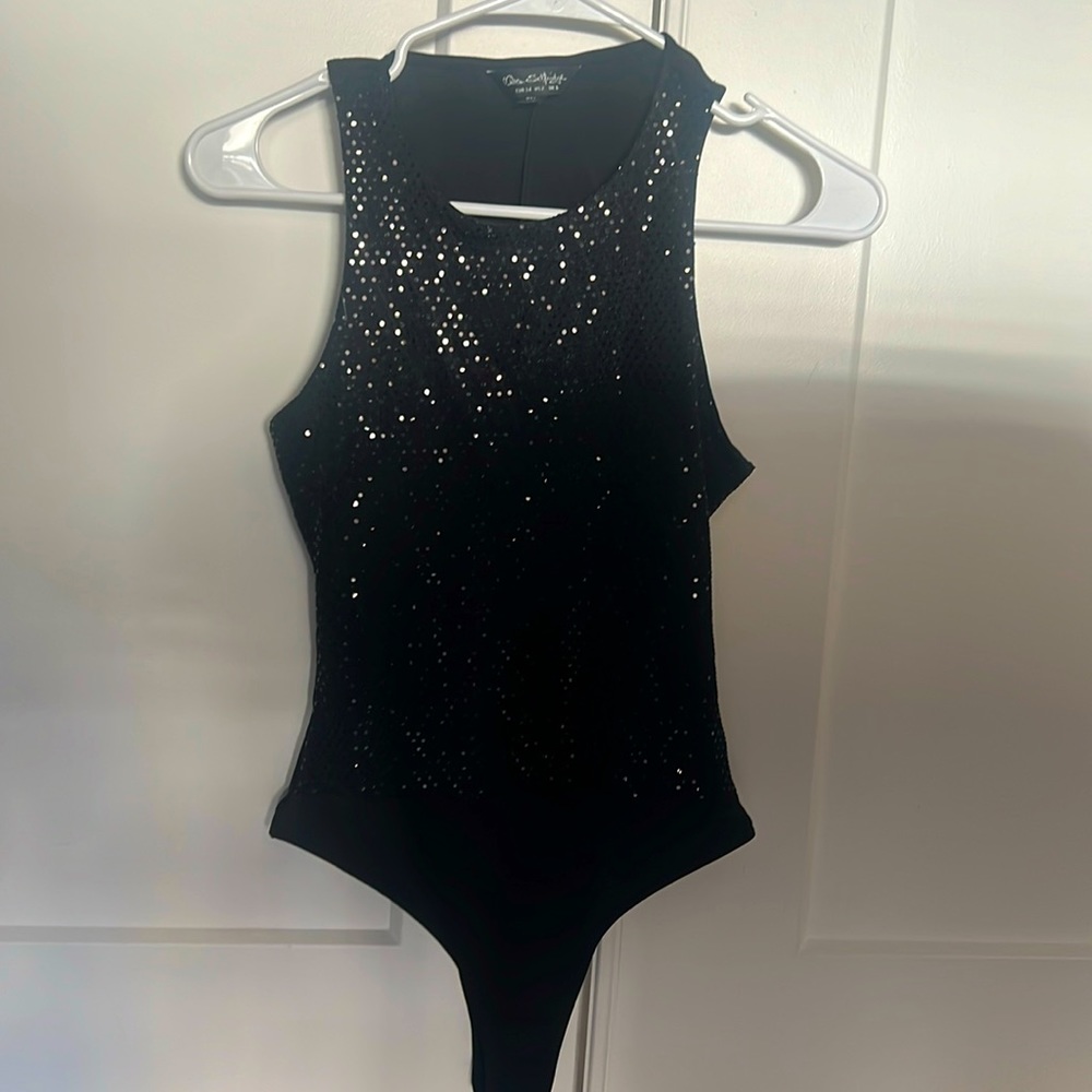 Black sequins bodysuit. Size 2. No tags, but never worn.
